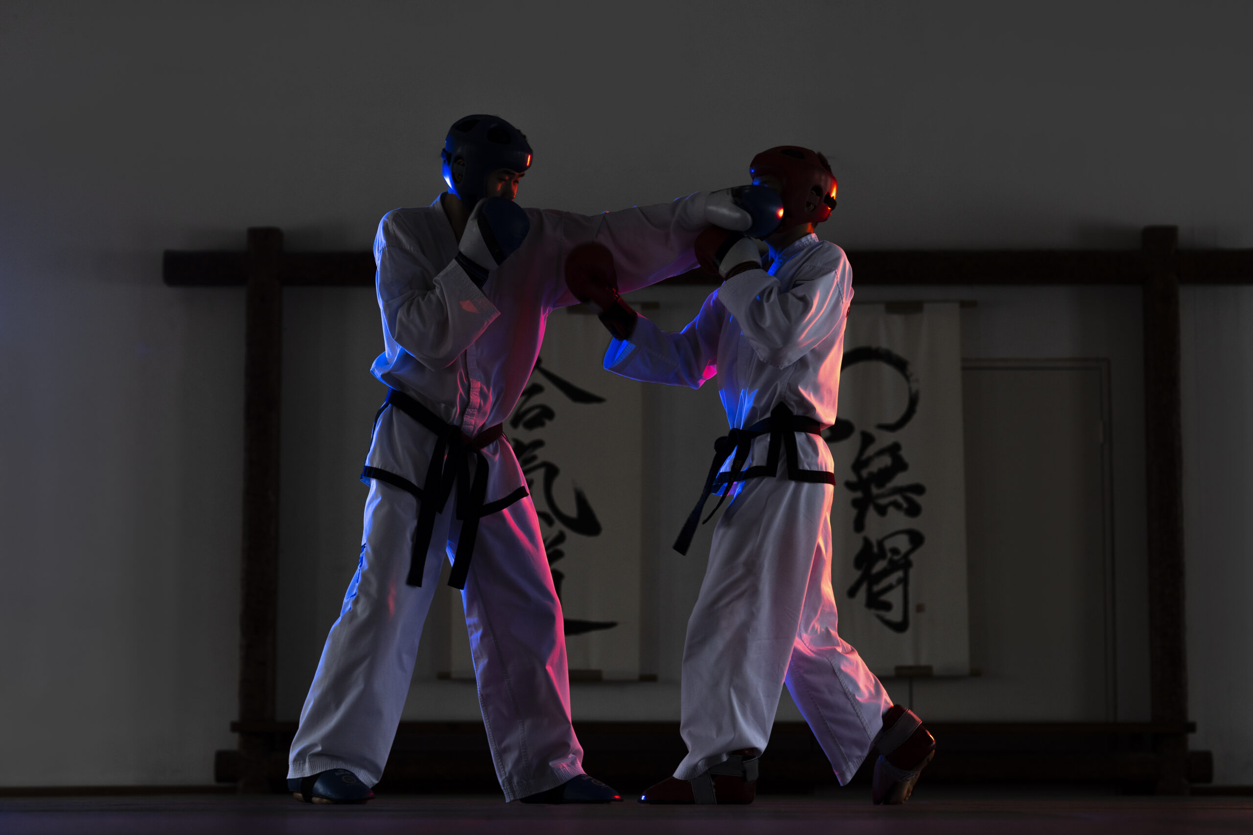 full shot people practicing taekwondo scaled